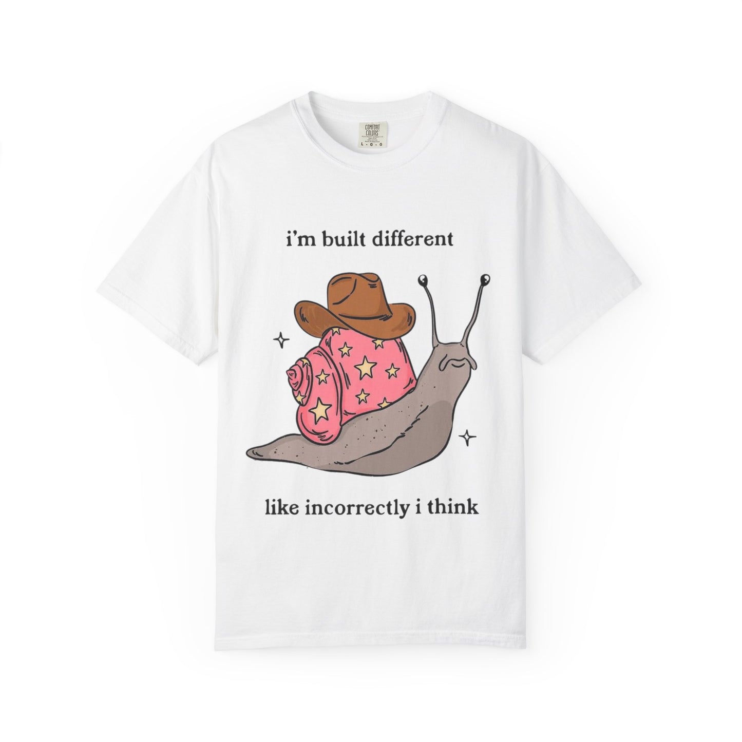 Snail Graphic T-Shirt — "i'm built different like incorrectly i think" Cute Cowpoke Shell Tee