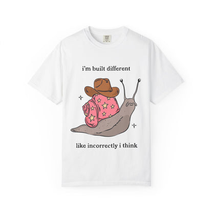 Snail Graphic T-Shirt — "i'm built different like incorrectly i think" Cute Cowpoke Shell Tee